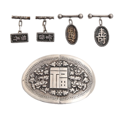 573 - A Chinese oval silver waist clasp and two pairs of cufflinks, early 20th c, with applied repousse fl... 