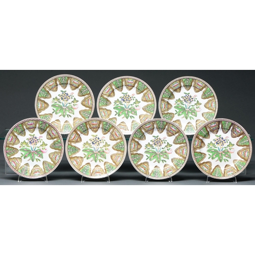 636 - A set of seven  Spode white earthenware plates, c1820, printed in sepia and enamelled with a floweri... 