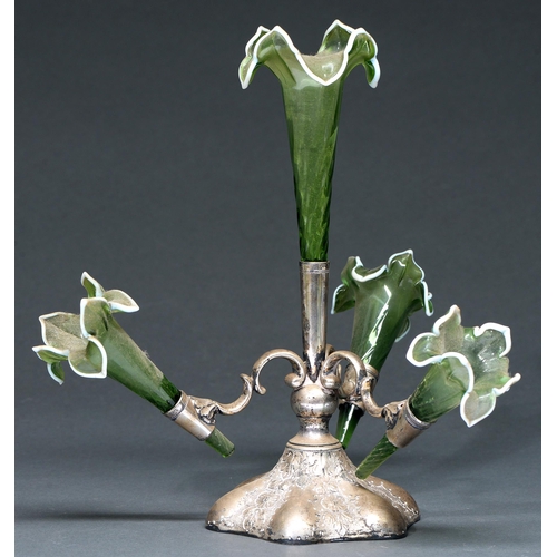 644 - A Victorian EPNS flower stand, the four wrythen fluted green glass trumpet vases with white rim, 31c... 