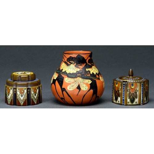 652 - Two Gouda art pottery inkwells and covers and a contemporary Swiss art nouveau earthenware vase of s... 