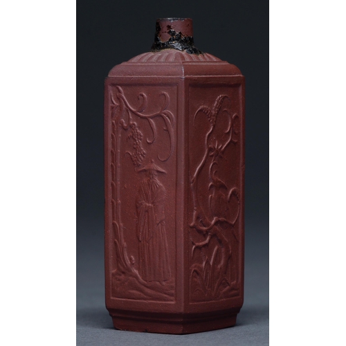 750 - A rare Elers Brothers red stoneware tea canister, 1690-98, slip cast and moulded in relief in the ch... 