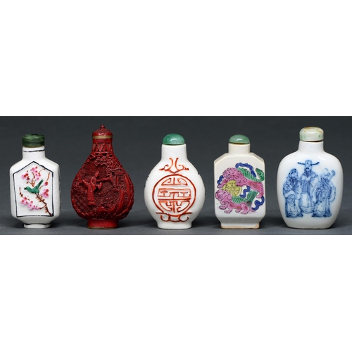 755 - Five Chinese famille rose and blue and white snuff bottles and a cinnabar lacquer example, 20th c,&n... 