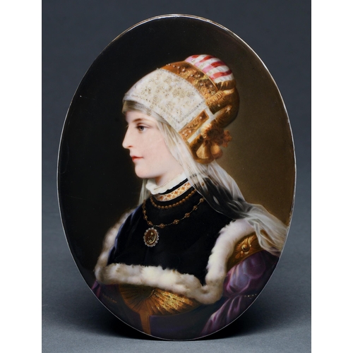 760 - A German porcelain plaque, c1890,  painted with a young woman in fur trimmed collar and jewels, oval... 