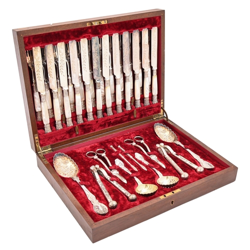 175 - A Victorian EPNS fruit service, including twelve mother of pearl hafted knives and forks, in plush l... 