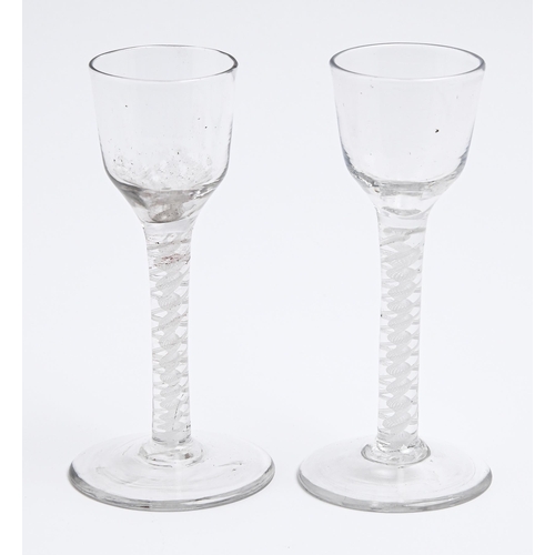 183 - Two English wine glasses, c1770, the ogee bowl on double series opaque twist stem, 14cm hThe collect... 