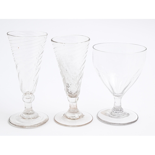 185 - Two English spirally fluted dwarf ale glasses and a rummer, late 18th c, 11 and 13.5cm hThe collecti... 