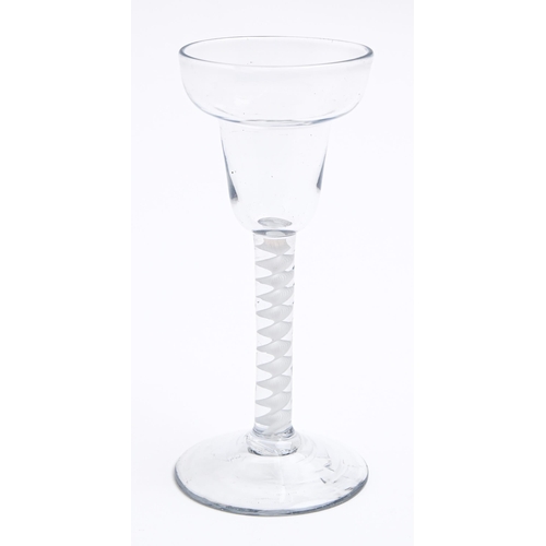 188 - An English wine glass, c1760, the pan-topped round funnel bowl on single series opaque twist stem, 1... 