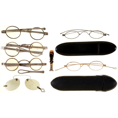 216 - Three pairs of English silver folding spectacles, early 19th c, one part marked, London 1835, three ... 