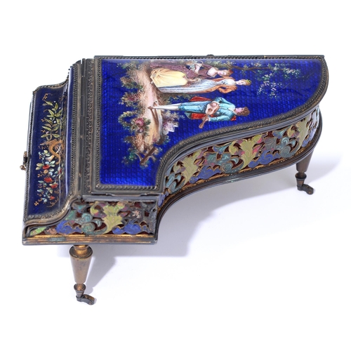 227 - A French musical giltmetal and enamel trinket box in the form of a grand piano, c1900, the lid paint... 