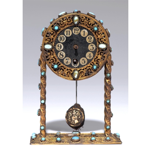 228 - A Continental miniature giltmetal timepiece, late 19th c, decorated overall with turquoise glass cab... 