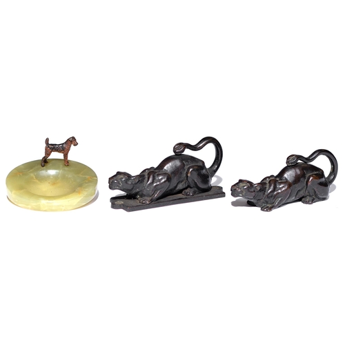 234 - A pair of bronze sculptures of a crouching leopard, early 20th c, one on flat base for mounting, ric... 