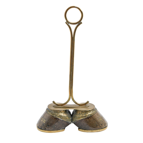 261 - A Victorian brass mounted twin horse hoof doorstop, with ring handle, each hoof applied with the nam... 