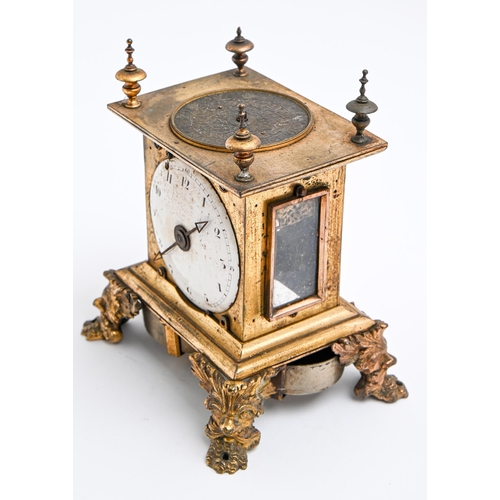 272 - A gilt brass table clock, 19th c and earlier, with silver, possibly champleve, dial to the top of th... 