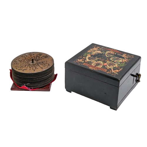 275 - A Symphonion disc music box, late 19th c, to play 14.8cm metal discs, in ebony case with polychrome ... 