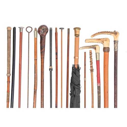 319 - Miscellaneous late Victorian and later malacca and leather covered riding crops, etcThe collection o... 