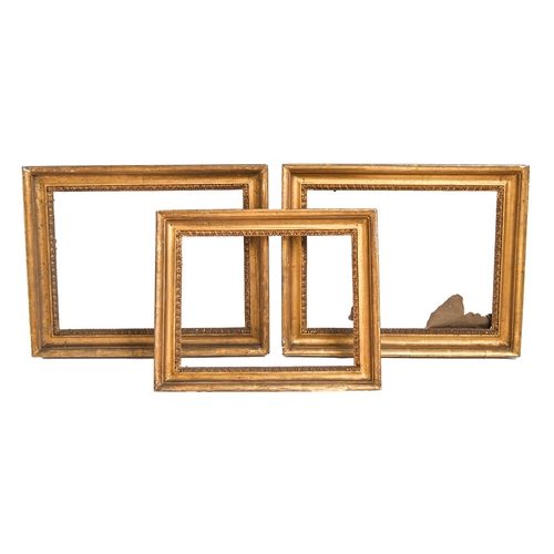 353 - A pair of giltwood and composition cavetto picture frames, early 19th c, sight 25 x 34cm and one oth... 