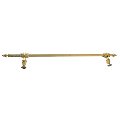 354 - A Victorian brass curtain pole, with hexagonal offsets and terminals, 22cm projection, 165cm lThe co... 