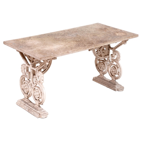 384 - A garden bench, the rectangular marble slab on ornate cast metal end supports united by a stretcher,... 