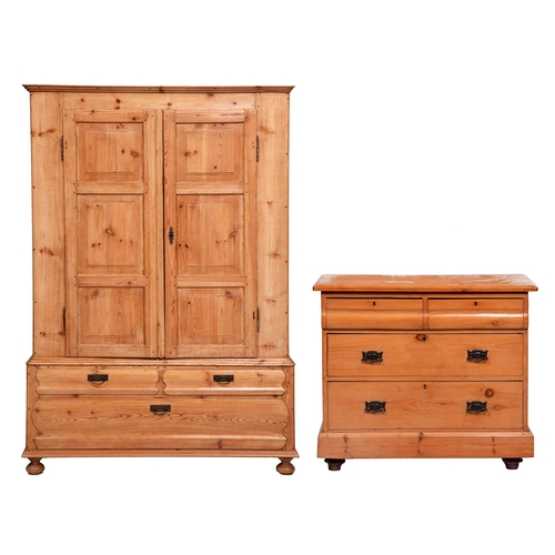 405 - A Victorian pine chest of drawers and a pine wardrobe, with panelled doors above three drawers, ward... 