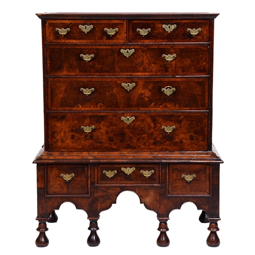 407 - A George I walnut and feather banded chest on stand, 127cm h; 54 x 103cmThe collection of C. W. Brig... 