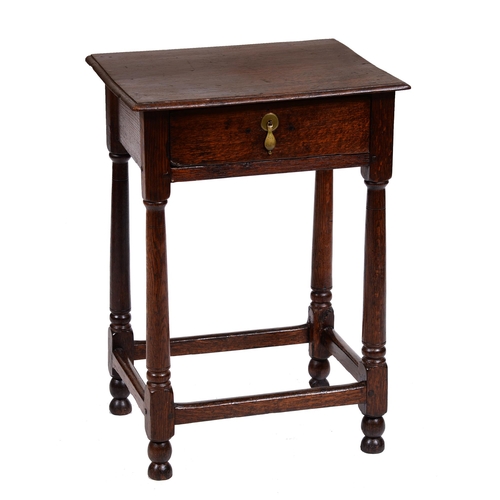 413 - An oak side table, on turned legs united by stretchers, 67cm h; 37 x 47cmThe collection of C. W. Bri... 