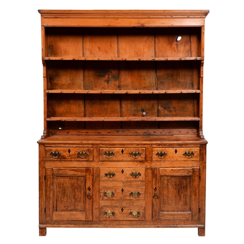 419 - A George III fruitwood and pine dresser, early 19th c, with reeded cornice and three shelf boarded r... 