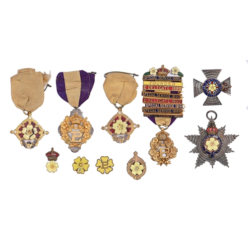 510 - Primrose League, unusual group of medals and badges of the League, including a Founder’s bar, base m... 