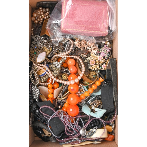 68 - Miscellaneous costume jewellery, early 20th c and later, a pink leather jewel box, etcThe collection... 