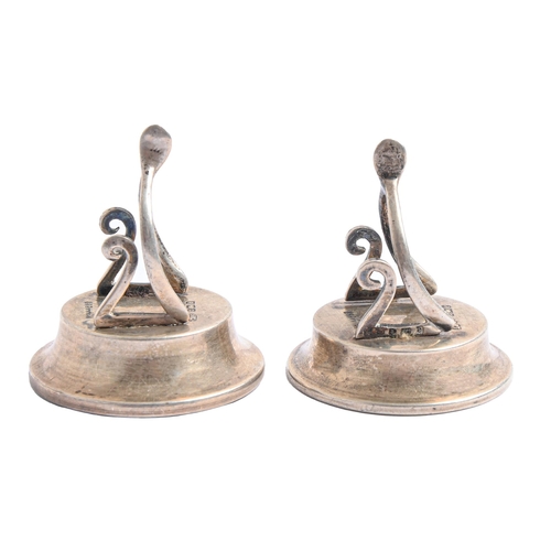 77 - A pair of Edwardian silver wishbone novelty place stands, 46mm h, by Levi & Salaman, Birmingham ... 