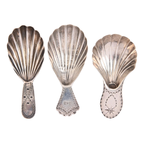 86 - Three George III silver caddy spoons,  with fluted shell bowl, all London, by various makers, 1787, ... 