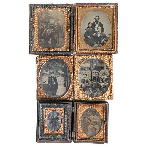 1195 - Photography. Six ambrotypes, mid-19th century and later, including a hand-tinted African American ba... 