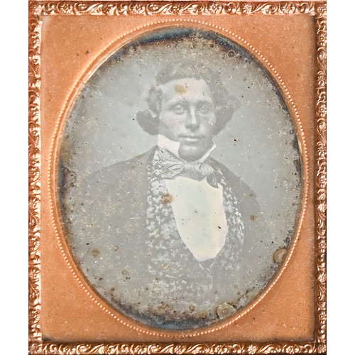 1192 - Photography. A quarter-plate daguerreotype portrait of a gentleman, c. 1850-56, half-length, seated ... 