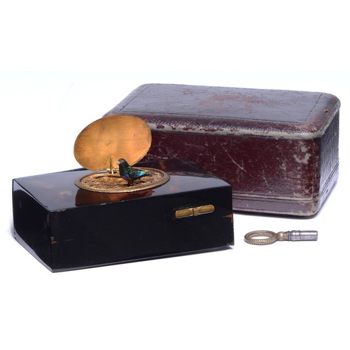 225 - A Swiss tortoiseshell singing bird box, late 19th c, the oval silver lid engraved with birds, spring... 