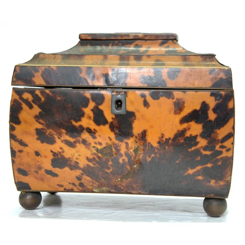 242 - A Victorian tortoiseshell tea caddy, with pagoda lid and veneered in matched blond shell, the divide... 