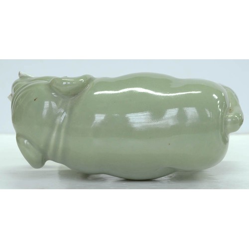 200 - A Chinese celadon model of an elephant,  20th c, 18cm h, wood stand (2)The collection of C. W. Brigg... 