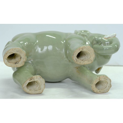 200 - A Chinese celadon model of an elephant,  20th c, 18cm h, wood stand (2)The collection of C. W. Brigg... 