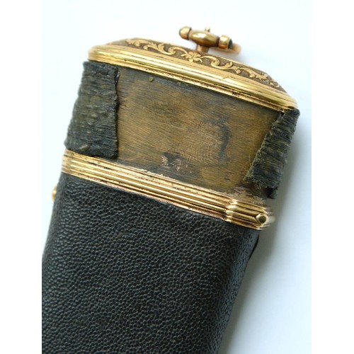 212 - A George II fishskin covered copper gilt etui,  the lid chased with stylised leaves on a sable groun... 