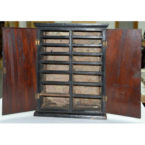 301 - A mahogany and ebony collector's cabinet, 19th c, fitted with sixteen drawers with brass wire ring p... 