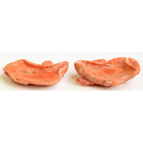 229 - Two Chinese coral carvings of a lotus leaf, late 19th / early 20th c, approximately 60mm, 32 and 42g... 