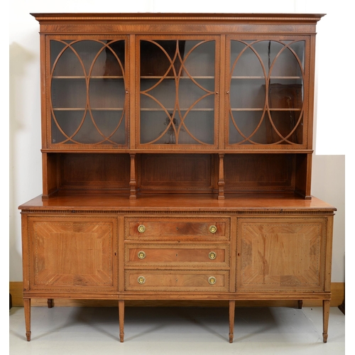 1369 - A German mahogany and broken line inlaid sideboard, c1910, the superstructure with three glazed door... 