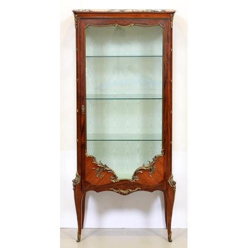 1384 - A French brass mounted mahogany cabinet, 20th c, in Transitional style, with marble slab, the door f... 