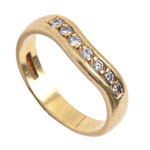 36 - A seven stone diamond ring, in 18ct gold, marks obscured, 4.5g, size O