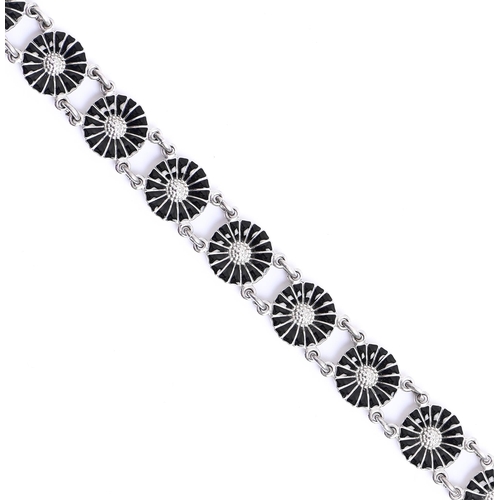 52 - Georg Jensen. A silver and black enamel daisy bracelet, 19cm l, maker's mark, 19.7g