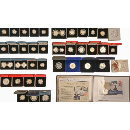 544 - Silver and fine silver coins. Miscellaneous proof and UNC Crowns and others, mainly United Kingdom, ... 