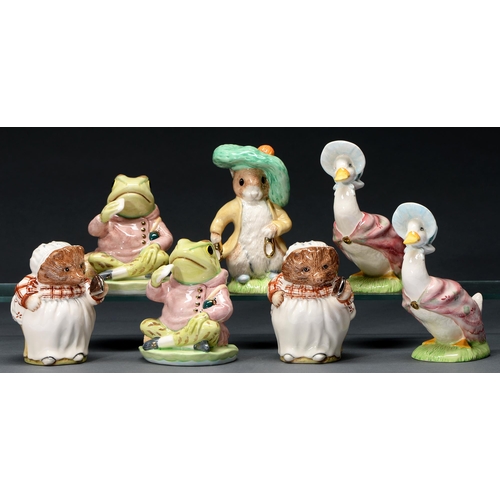 575 - A set of seven Royal Doulton Beswick Ware figures Beatrix Potter characters, late 20th c, 12.5cm h, ... 