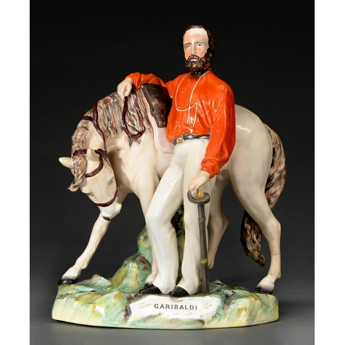 585 - A Staffordshire earthenware figure of Garibaldi, c1860, in colours, the base with black printed titl... 