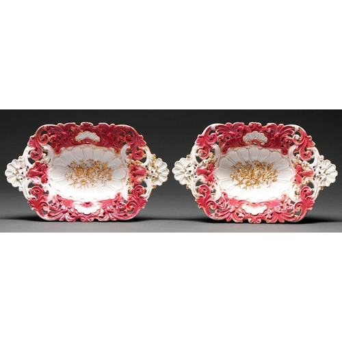 587 - A pair of Meissen pierced dishes, c1860, with shell handles and moulded with scrolling foliage, deco... 