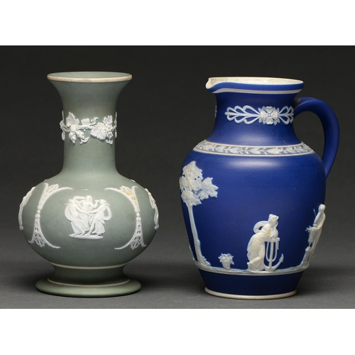 598 - A Wedgwood green jasper dip vase and a dark blue jasper dip jug, both c1900, sprigged with classical... 