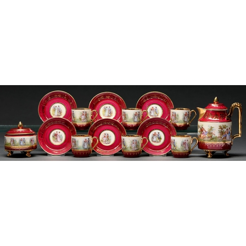 601 - A Vienna style claret ground porcelain coffee service, 20th c, printed and painted with continuous s... 