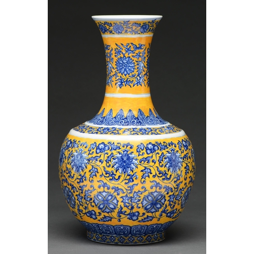 613 - A South East Asian yellow ground blue and white earthenware vase, in Chinese style, 35cm h, Kangxi m... 